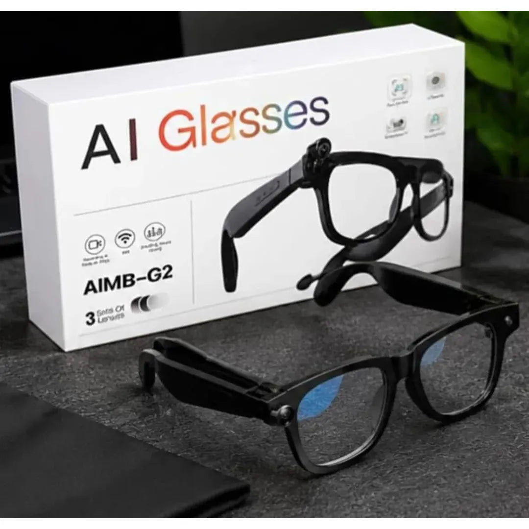 Black AI smart glasses shown in front of their white product packaging box, placed on a dark textured surface.